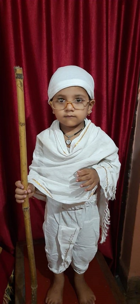 Young Indian Boy dressed in Costume as a child Mahatma Gandhi Stock Photo -  Alamy
